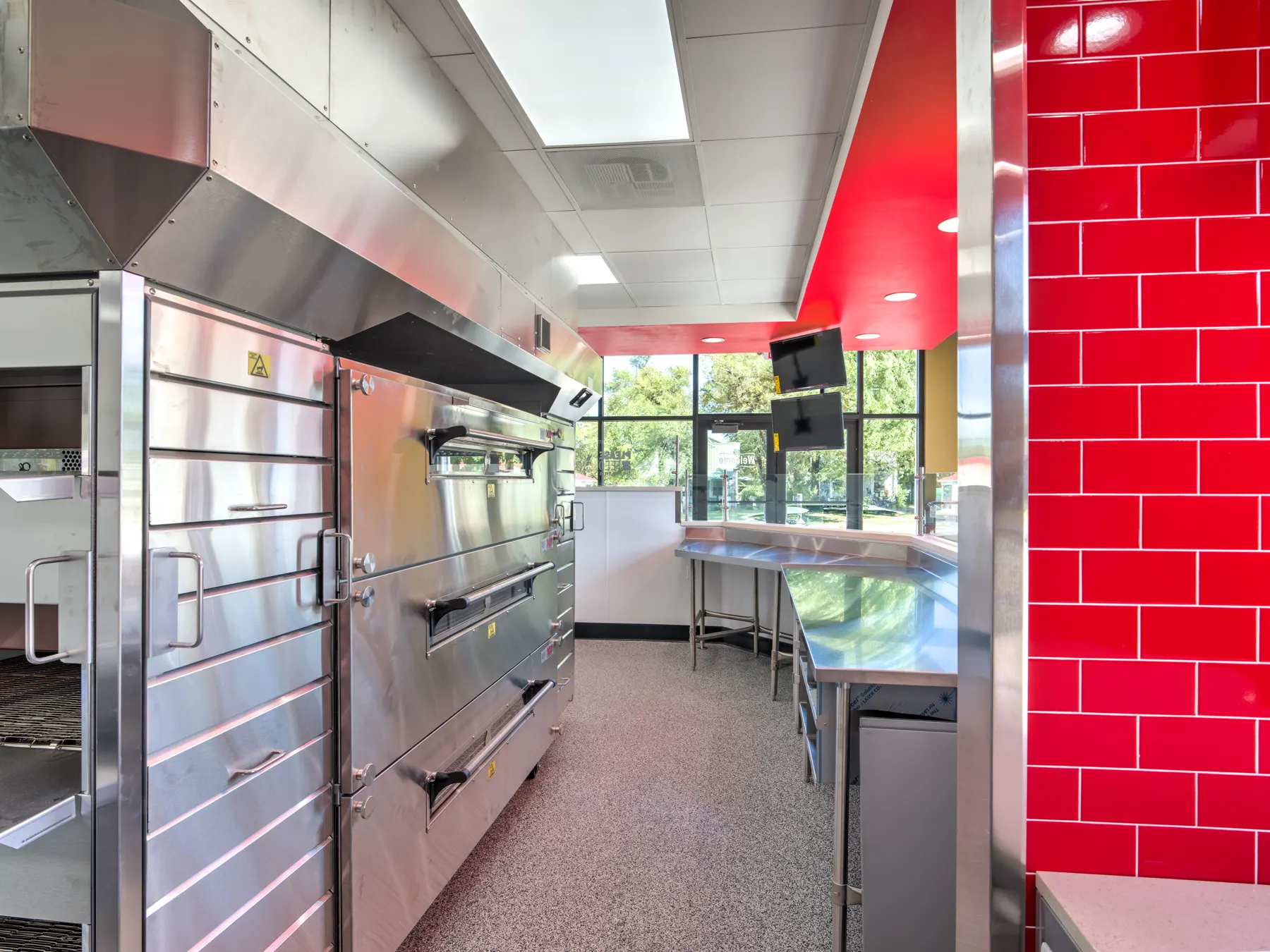 Commercial restaurant kitchen with red tile