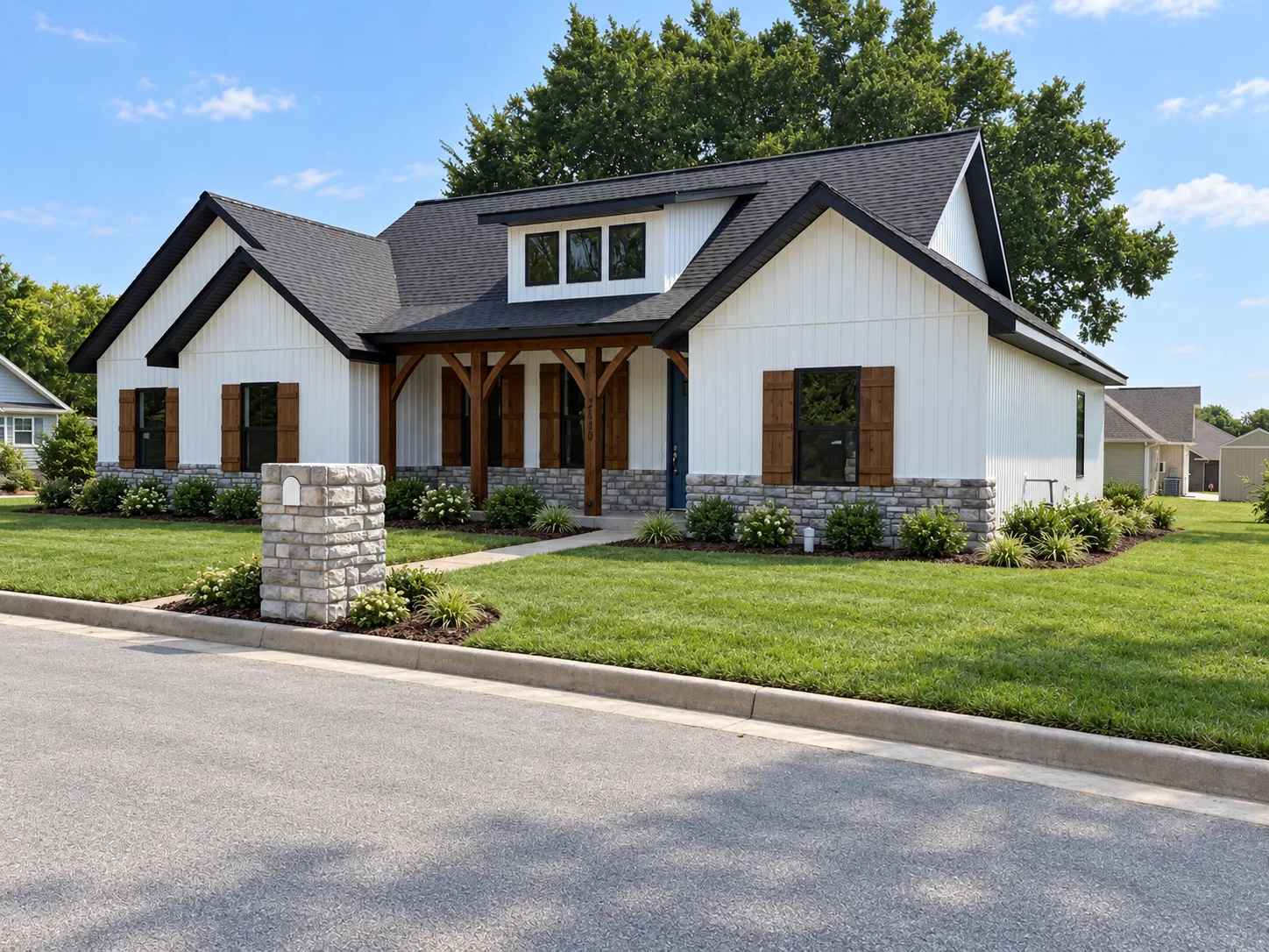 Completed spec home at 2140 Harlow St with white board and batten siding, stone wainscot, timber front porch and landscaped lawn