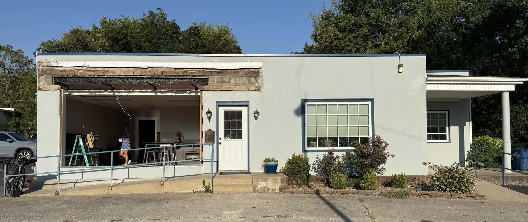 Knell Tax during construction with the old storefront removed and the front opened up